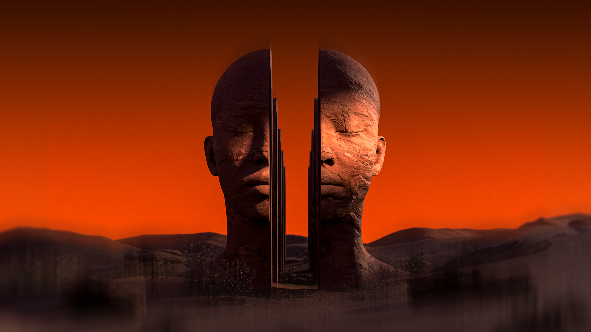 CORE festival main stage with twin sculptural faces, lights and smoke